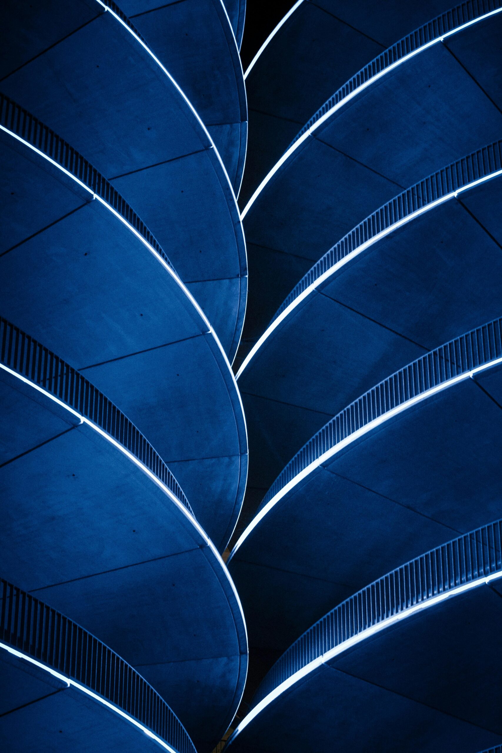 Blue railings intersection to form a geometric shape