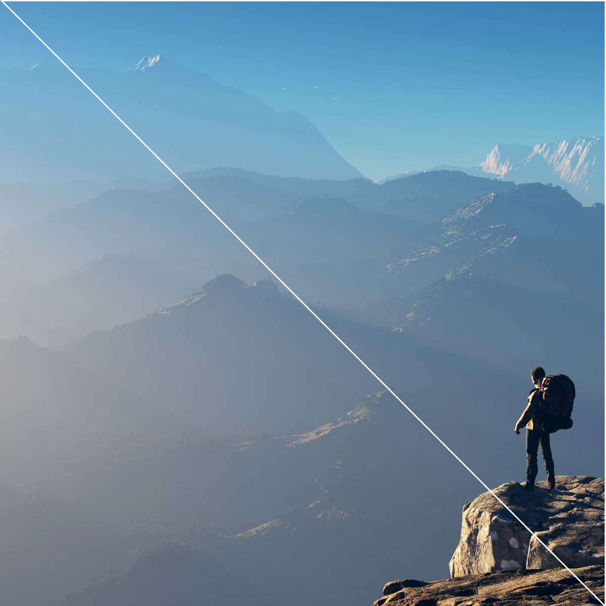 Man standing on mountaintop