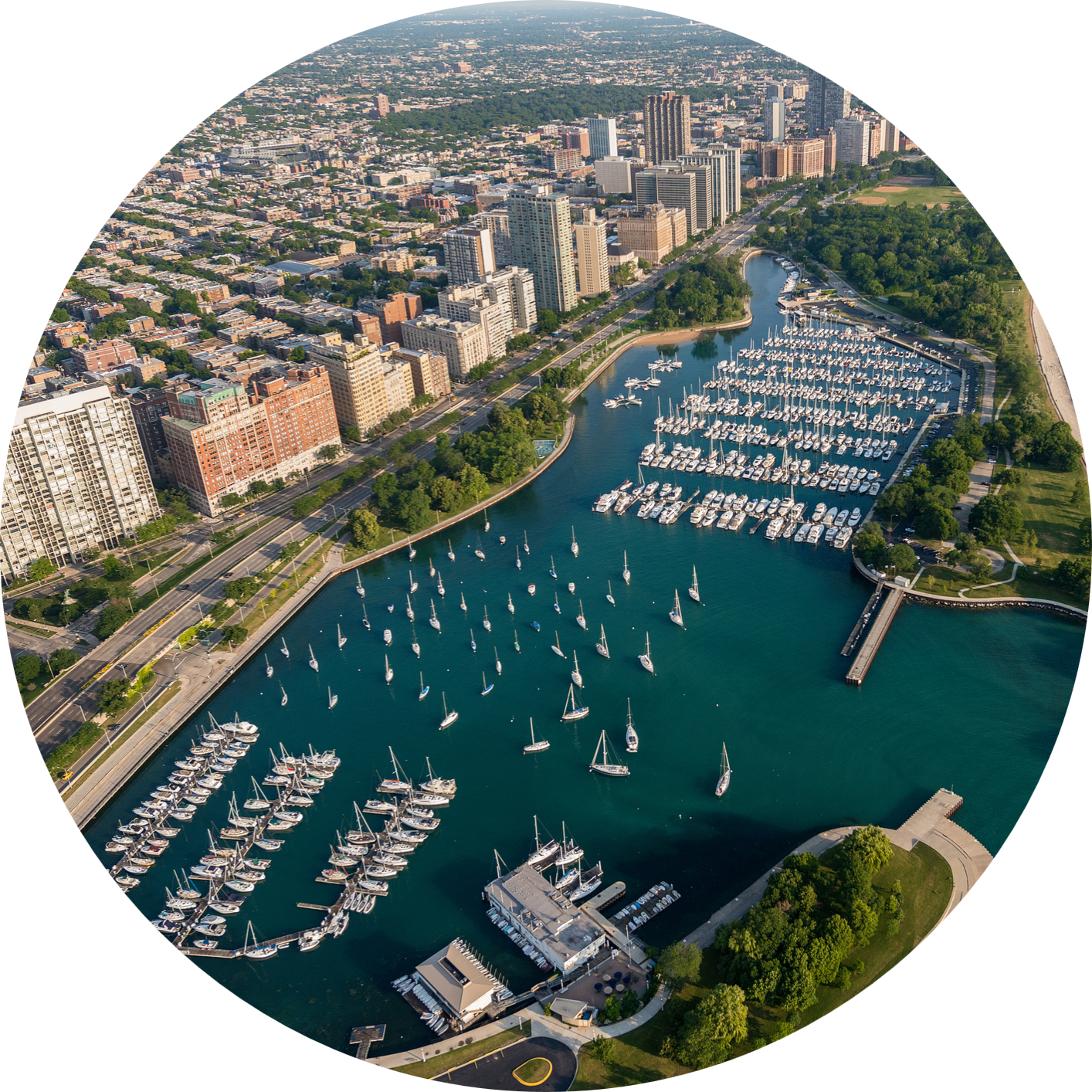 circle cutout of ships in Belmont Harbor from above