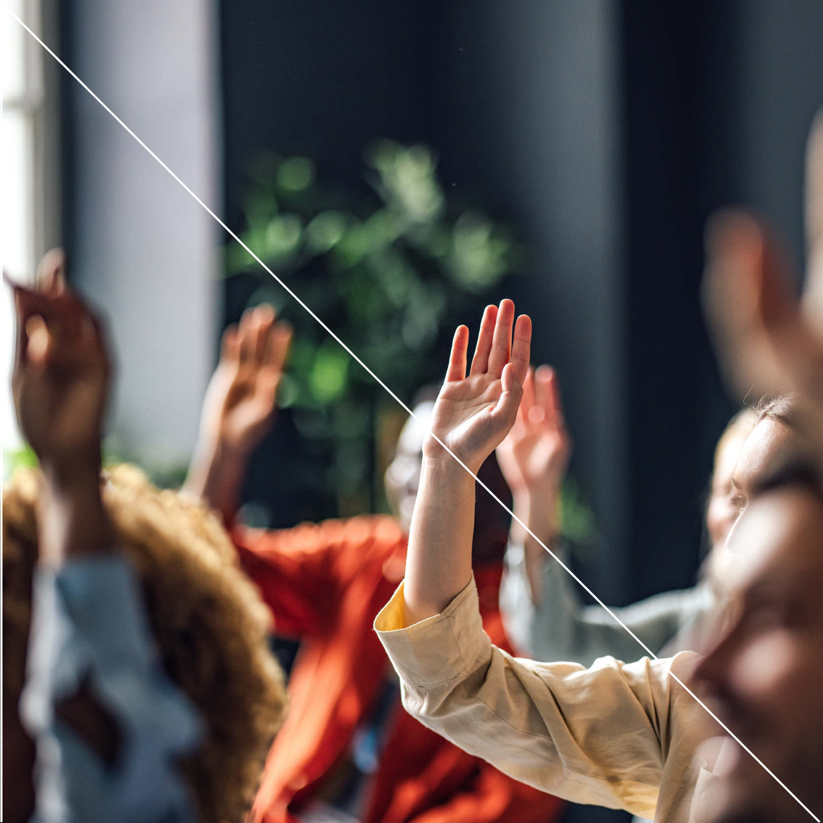 Group of people with their hands up in the air with a white right angle triangle overlayed on top of the image for stylistic impact