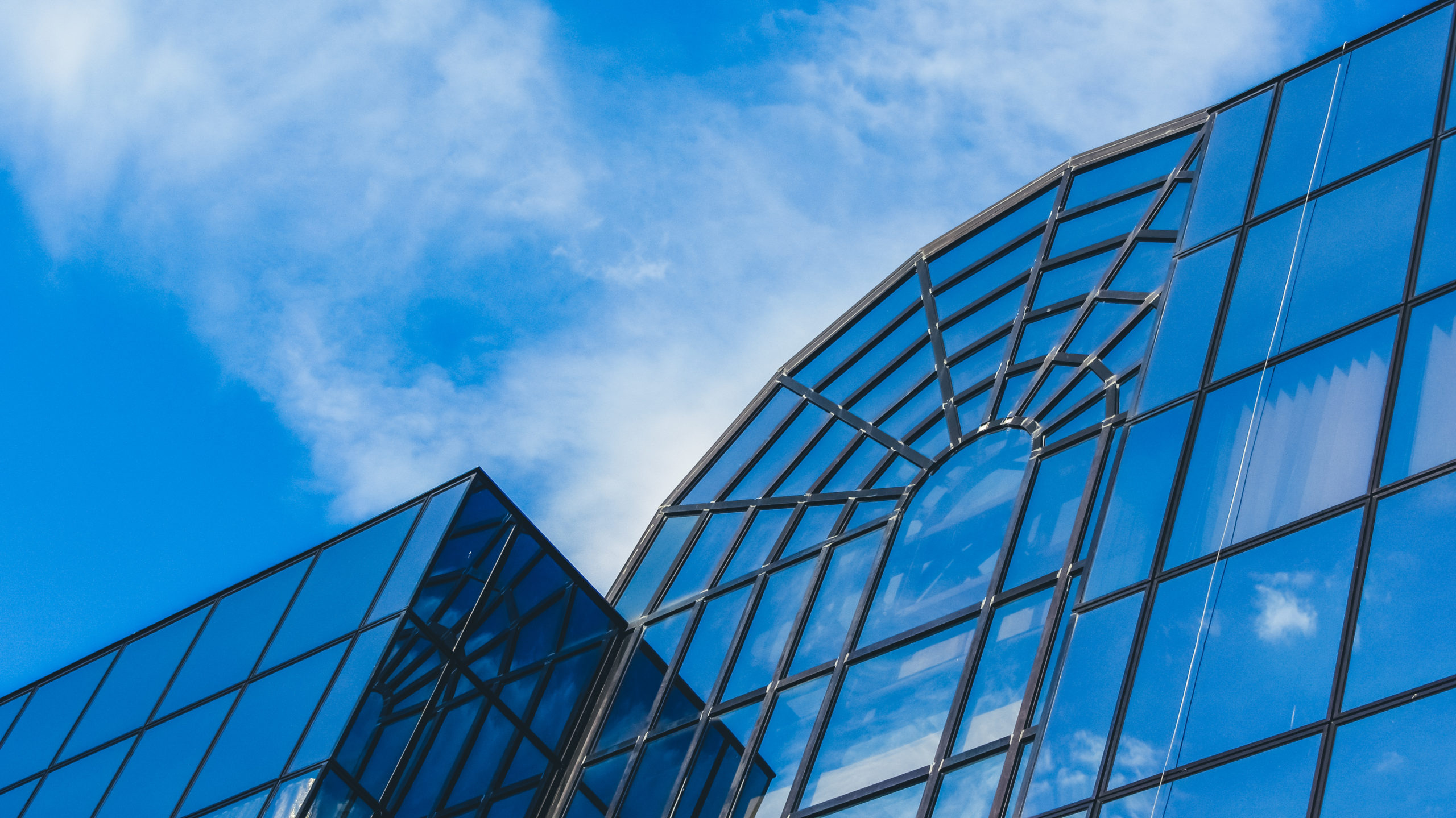 Investment Perspectives – Secondary Refresh Blue building with sky