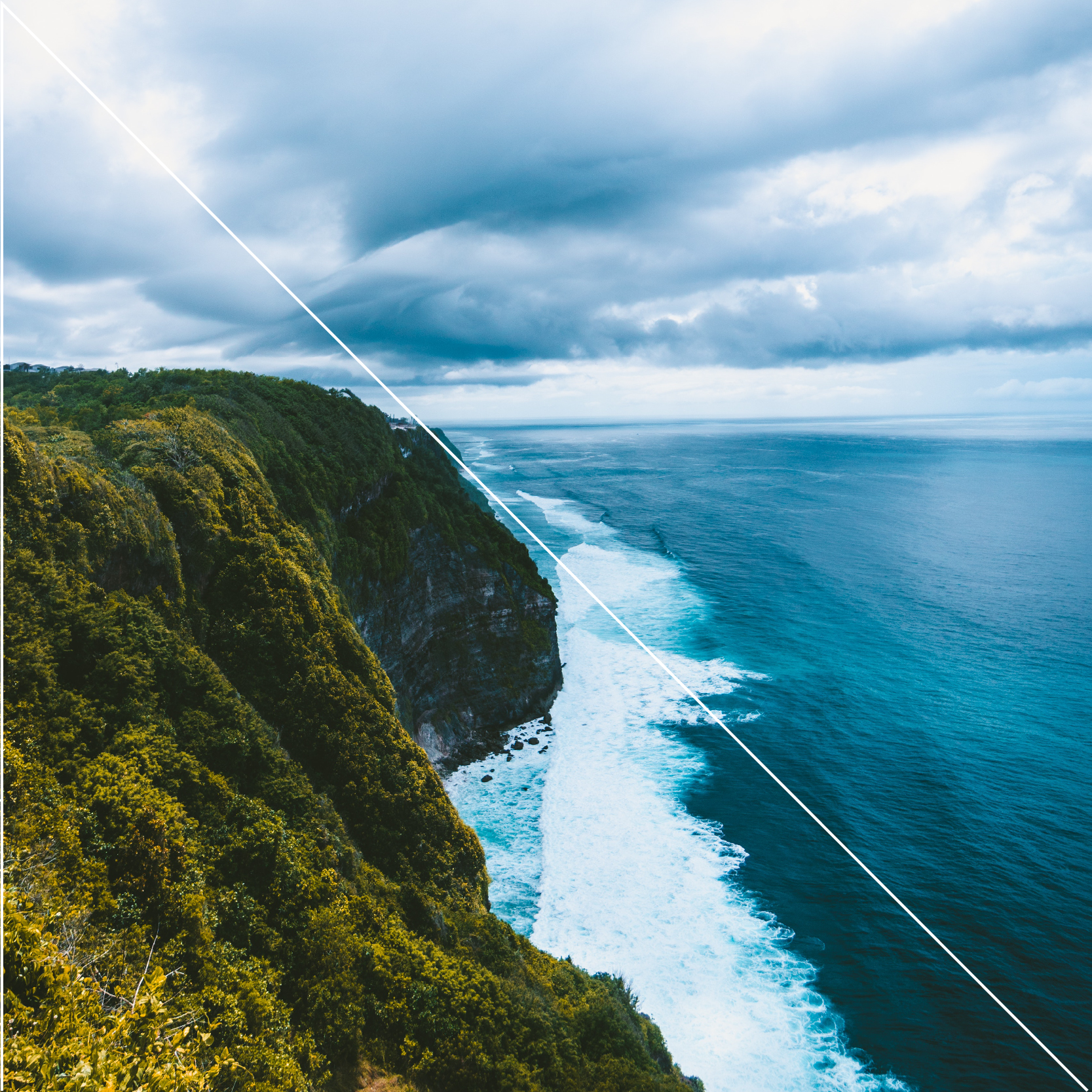 Mountainous coastline with a white right angle triangle overlayed for stylistic impact